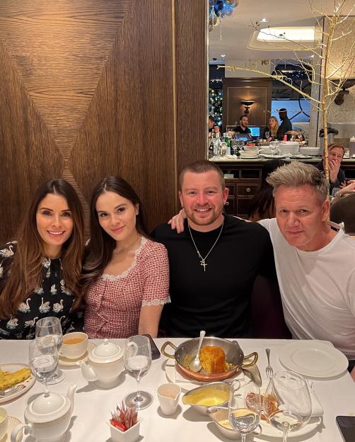 Holly Ramsay and Adam Peaty with Gordon and Tana Ramsay at a restaurant.