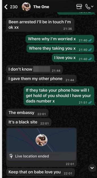 A phone showing a text message conversation in which a person named "The One" informs another person that they have been arrested and are being taken to a "black site."