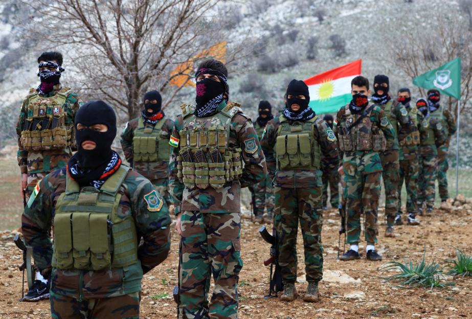 Iranian Kurdish fighters from the Kurdistan Freedom Party (PAK) participating in a training session.