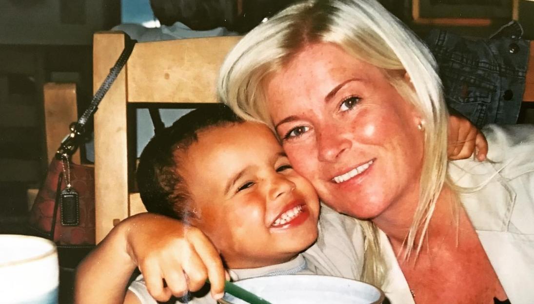 Harrison Sullivan, also known as HISTIKKYTOKKY, poses by a pool with a city skyline in the background.