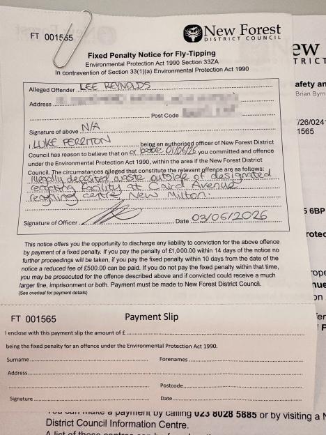 A close-up of a Fixed Penalty Notice for Fly-Tipping from New Forest District Council, addressed to Lee Reynolds, for illegally depositing waste outside a recycling facility.