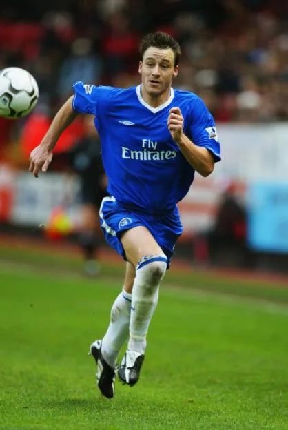 John Terry of Chelsea chases the ball