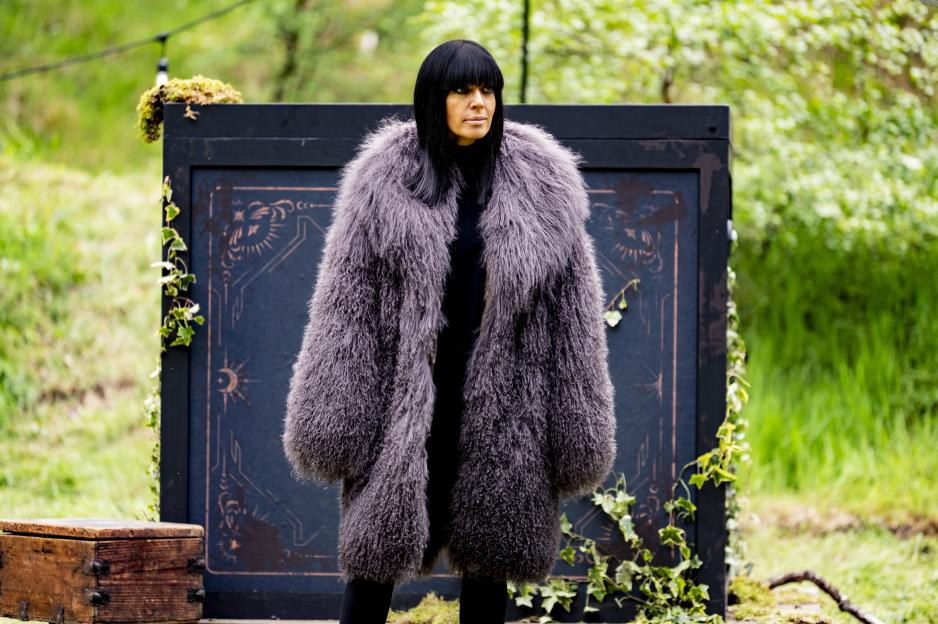 Claudia Winkleman in a large grey fur coat.