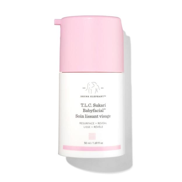 Drunk Elephant T.L.C. Sukari Babyfacial Resurface + Reveal facial treatment in a white bottle with a pink pump.