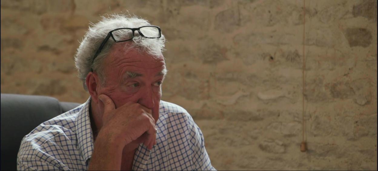 Jeremy Clarkson listening intently.