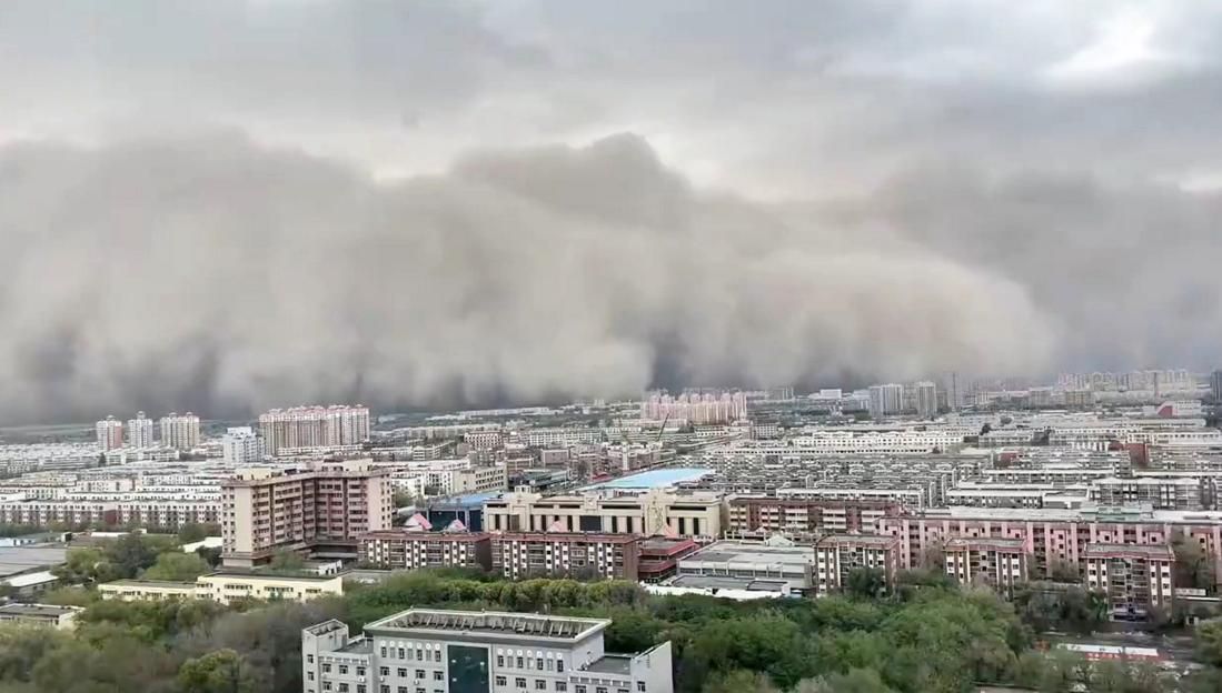 Powerful sandstorm triggers wall of thick dust swallowing city skyline in seconds
