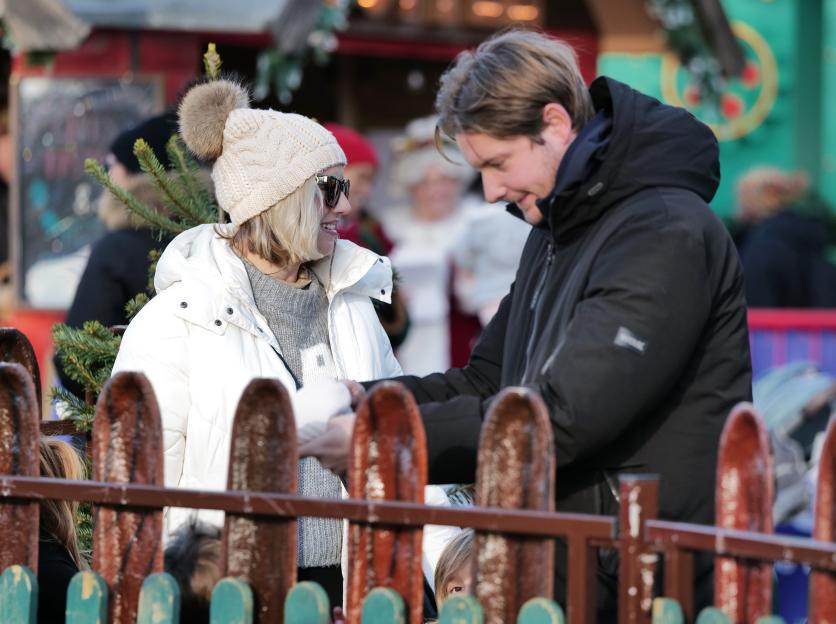 Loved-up Kelsey Parker and boyfriend Will look head over heels at Winter Wonderland