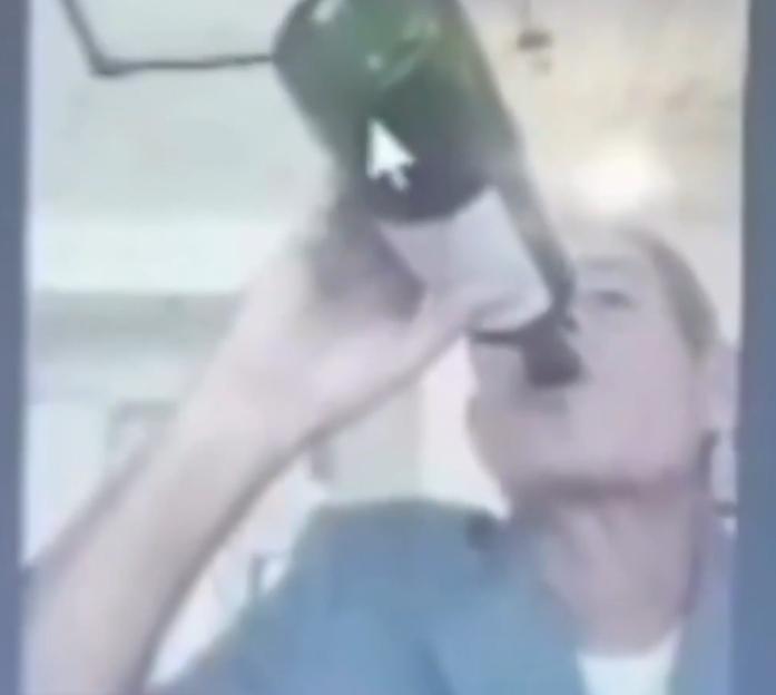 Bizarre Courtroom Scene: Judge Swigs Wine from the Bottle and Lights a Cigarette with a Blowtorch!