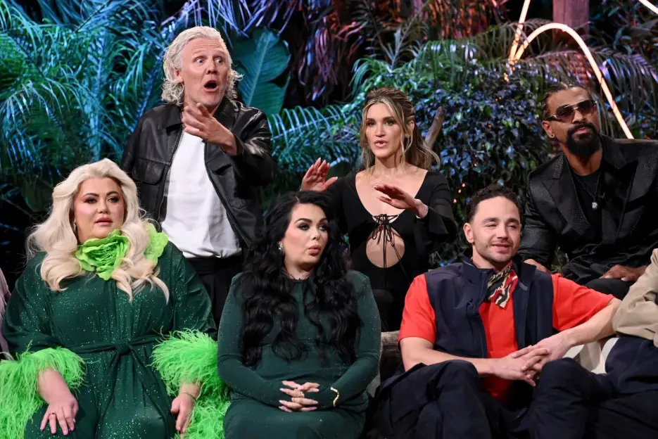 Six celebrities, including Gemma Collins and Jimmy Bullard, sitting on a set with tropical foliage in the background.