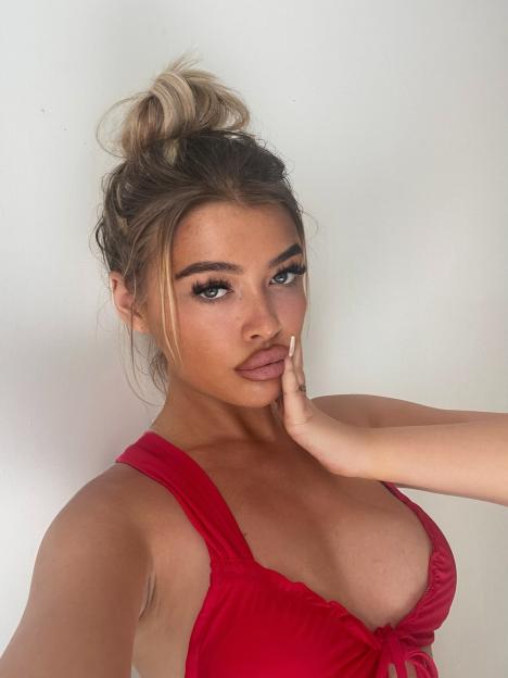 Model Madison Page wearing a red top.
