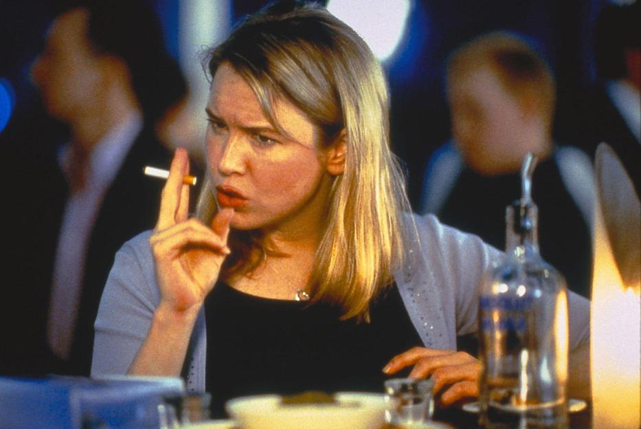 Renée Zellweger as Bridget Jones in Bridget Jones's Diary (2001), holding a lit cigarette and looking at the side.