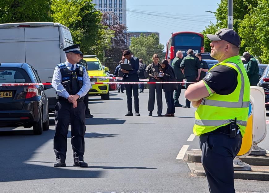 Police officers at the scene in Golders Green, north-west London, after two people were stabbed.