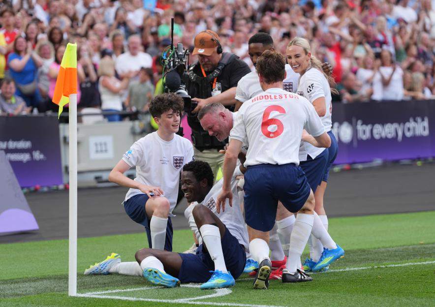 Players from England and Soccer Aid World XI FC celebrating during the Soccer Aid for UNICEF 2026 match.