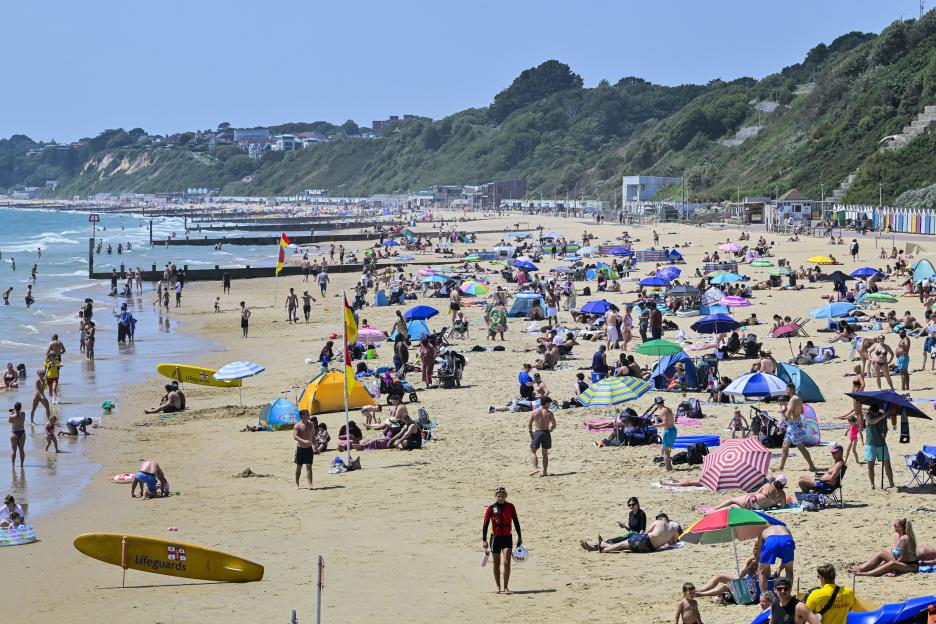 'Red Heat Alert Hits UK: Hundreds of Schools Close and Travel Warnings Issued as Temperatures Soar Toward 40°C!'