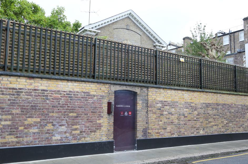 Anti-graffiti protection covering the side gate to Freddie Mercury's home, Garden Lodge.