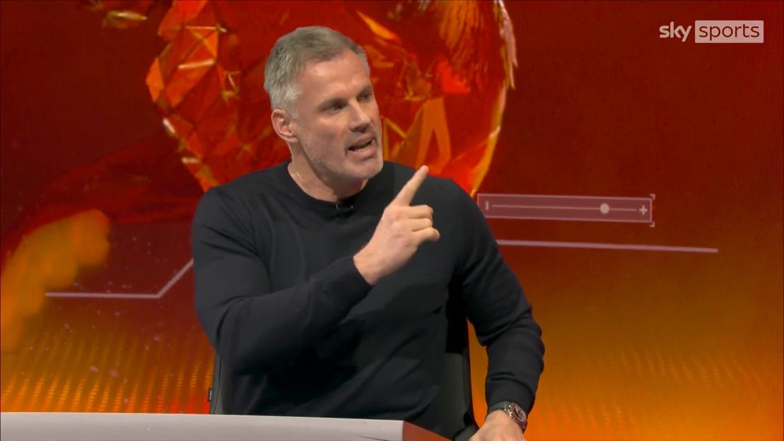 Jamie Carragher gesturing while speaking on Sky Sports.