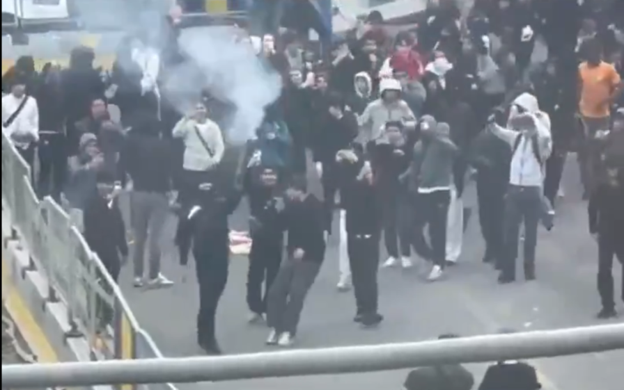 Protesters setting fires in Central Brussels.
