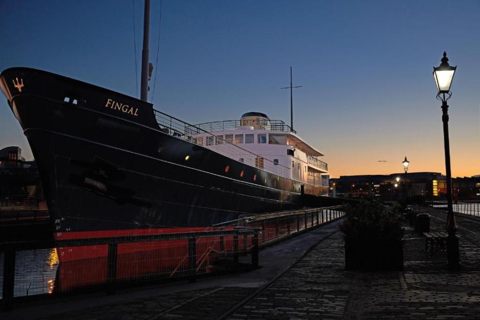 The Fingal Hotel, a 5-star luxury yacht hotel, at dusk.