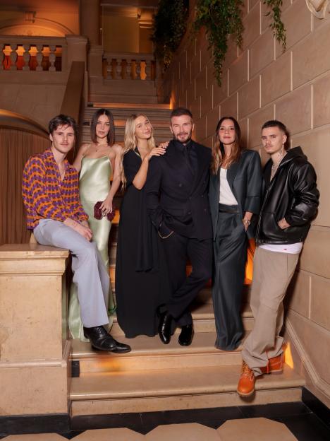 David and Victoria Beckham with their children, Romeo, Cruz, and Harper, and a partner, at Paris Fashion Week.