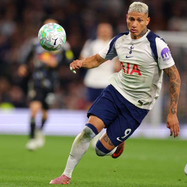 Richarlison playing for Tottenham Hotspur in a Premier League match against Leeds United.