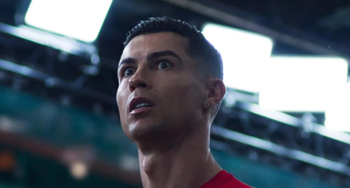 Cristiano Ronaldo looking intensely at something with wide eyes and open mouth.