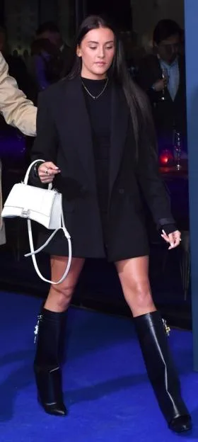 Marcus Rashford and Lucia Loi arrive at the "Rooney" World Premiere.