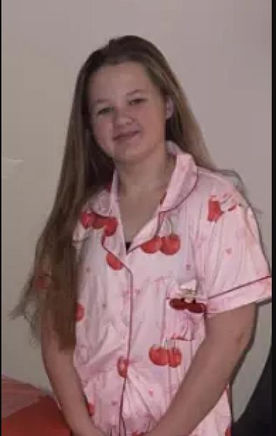 Letia Tinkler, a 12-year-old girl with blonde hair, wearing a black jacket and black leggings.