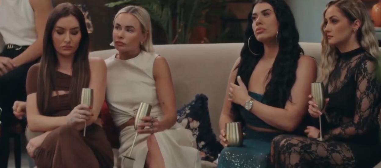 Four women (Leah, Leisha, Maeve, and Leigh) sitting on a couch.