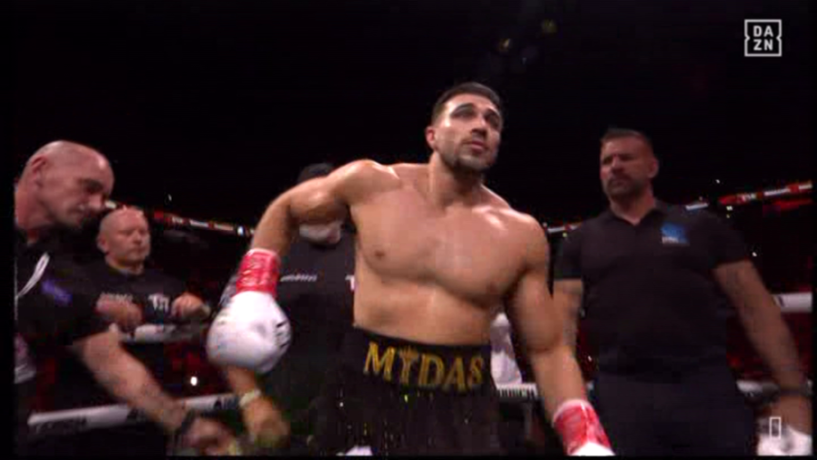 Tommy Fury in boxing attire with "MYDAS" written on his shorts.
