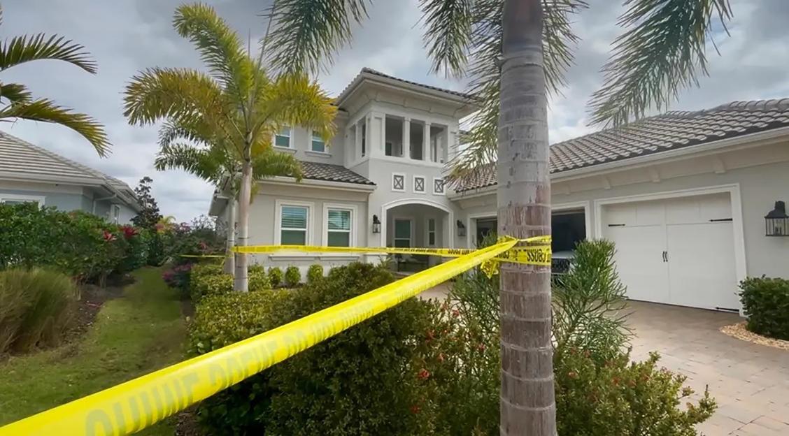 Lakewood Ranch home with yellow police tape across the front.