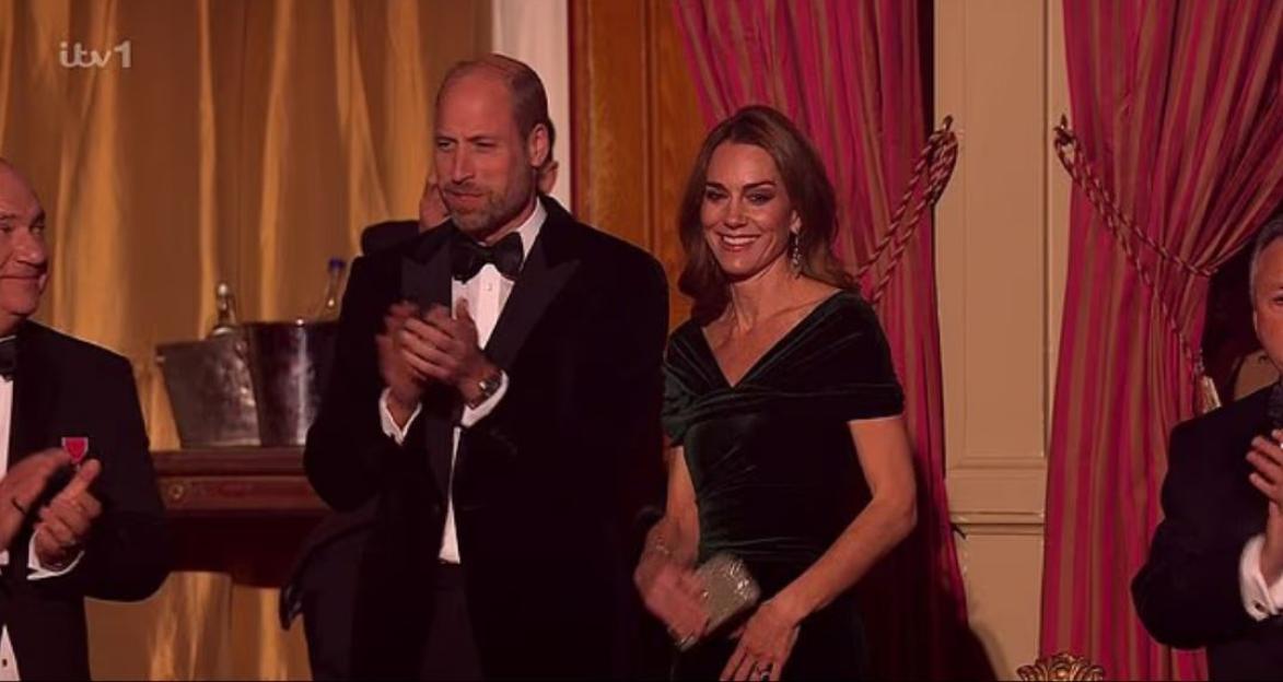 Kate and William beam and applaud during the Royal Variety Show.