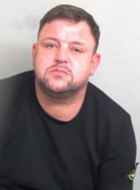 A mugshot of Jakub Jan Konkel.