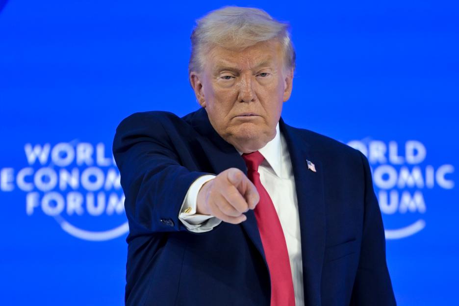 President Donald Trump gestures, pointing his finger forward, during his special address at the World Economic Forum.
