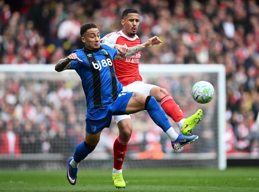 Marcus Tavernier of AFC Bournemouth battles for possession with William Saliba of Arsenal.