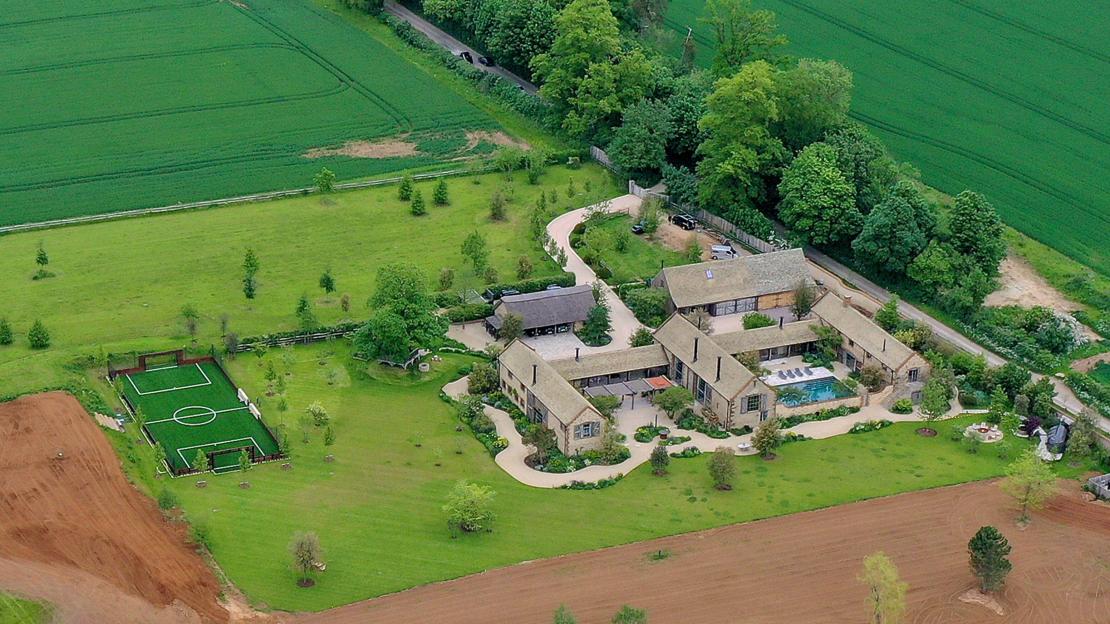 Great Tew, near Chipping Norton, UK. June 4th 2021. Aerial view of The Home David and Victoria Beckham in Great Tew. Credit: Sam Bagnall