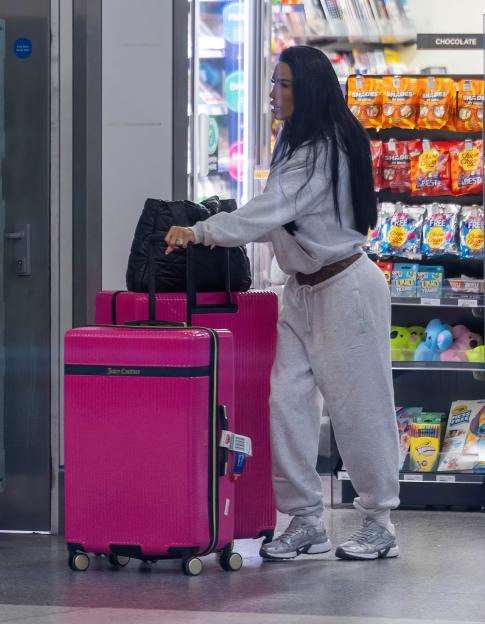 Excl - Katie Price has been spotted at Gatwick Airports North Terminal, checking in business class for a swanky Emirates flight to Dubai ? despite frantic pleas from those closest to her..Pals tell The Sun that friends and family have been desperatel