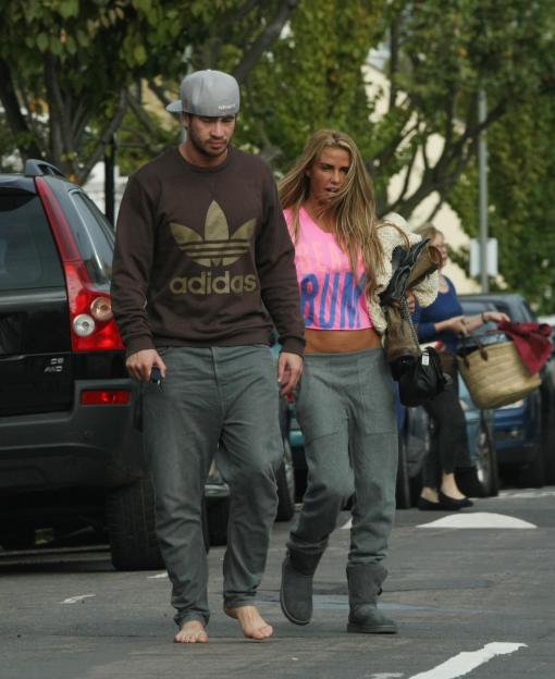 Katie Price and Danny Cipriani walking outside in Wandsworth, London.