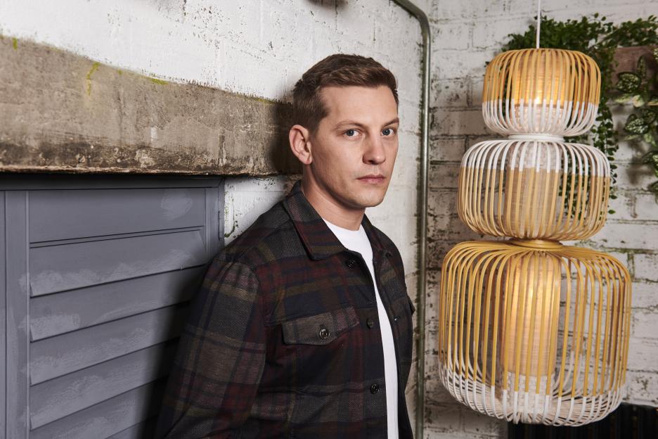 Actor Callum Kerr looking directly at the camera.