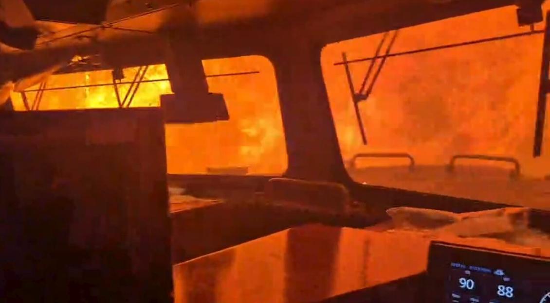 'Heart-Stopping Scene: Train Trapped as Wildfire Rages Amid Record-Breaking Heat Wave in North America'