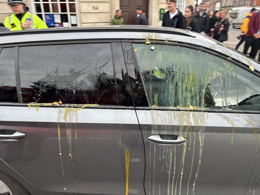 W8media..w8media Epsom High Street protest ..Crowds gather in Epson today and march towards the town hall. .Chaos erupts in the high street as protestors egg the police outside several hotels in the Surrey town of Epsom..Please see story for more inf