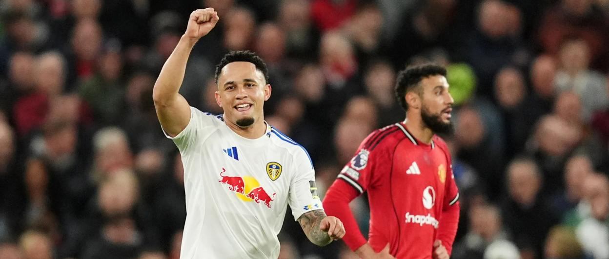 Noah Okafor celebrating a goal at Old Trafford stadium.
