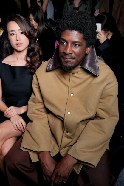 Labrinth seated at the Balenciaga fashion show.