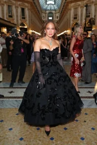 J Lo, 57, wows in black gown as she hits the runway in Milan… but has stiff competition as ROBOTS make catwalk debut