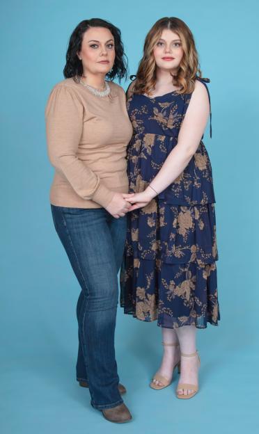 Ashley Hamilton and her daughter Sophie posing for a picture.