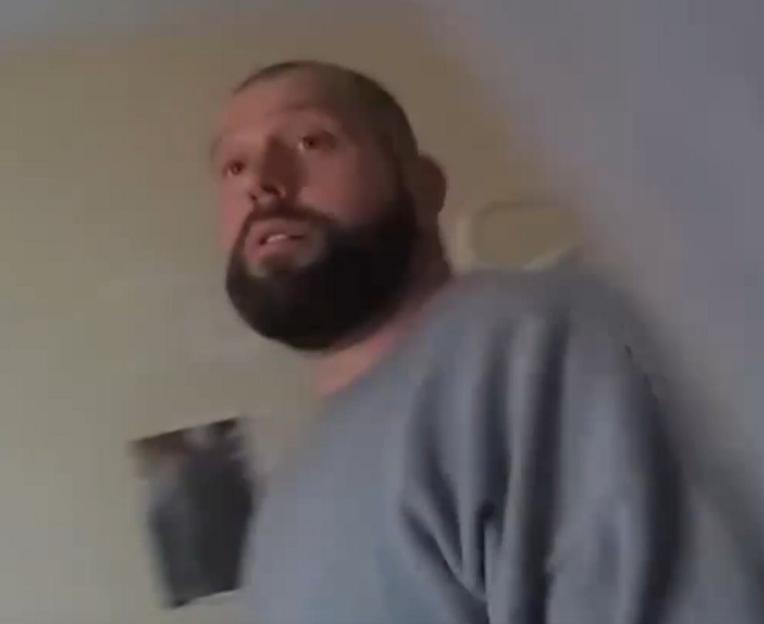 Man raised by serial killer says stepdad forcibly tattooed him aged 13