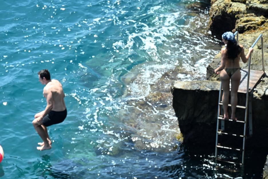 *PREMIUM-EXCLUSIVE* MUST CALL FOR PRICING BEFORE USAGE - Newlyweds Dua Lipa and Callum Turner looked every inch the loved-up couple as they soaked up the sunshine on the stunning Amalfi Coast during their romantic Italian honeymoon.