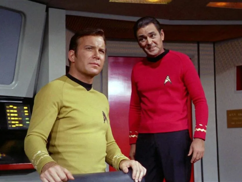 William Shatner as Captain James T. Kirk and James Doohan as Montgomery Scotty Scott on the set of Star Trek.