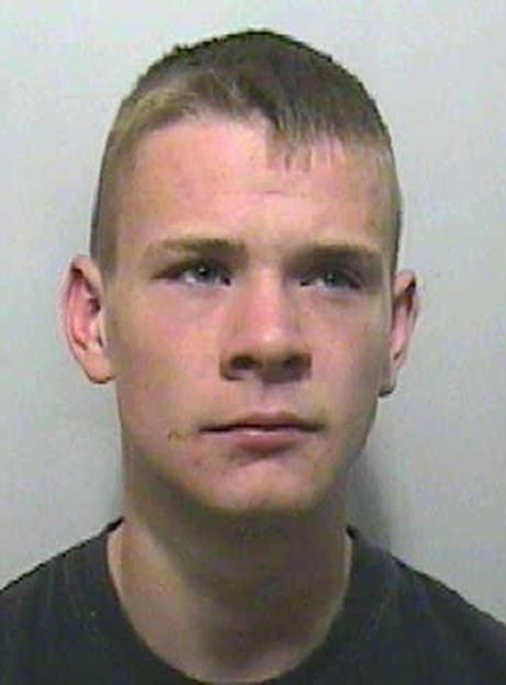 Mugshot of Ryan Herbert, a young man with short hair and light eyes.