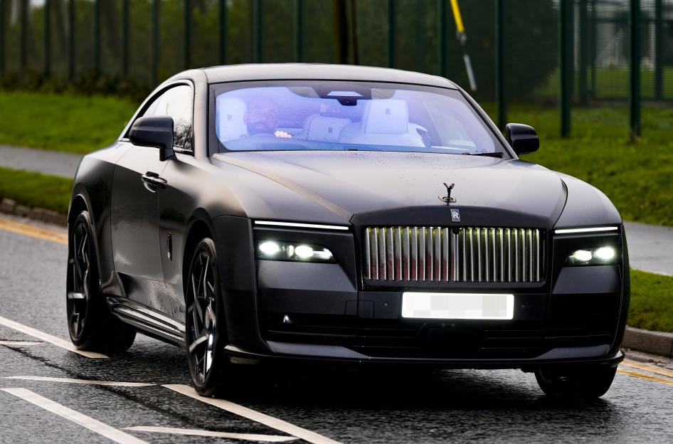 Mohamed Salah in a black Rolls-Royce arriving at AXA Training Centre, Liverpool.