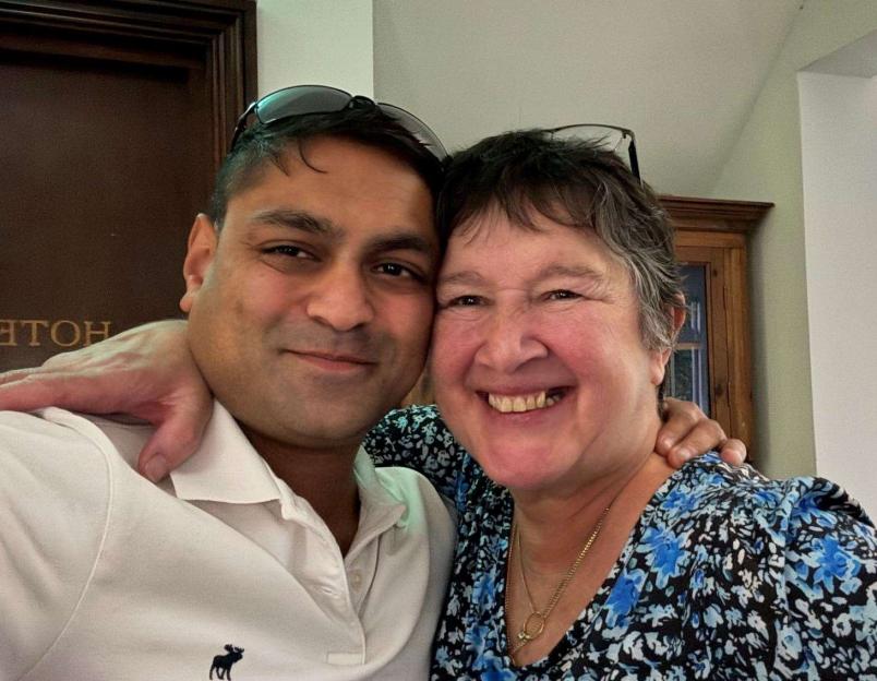 Elaine McGowan and her husband smiling.